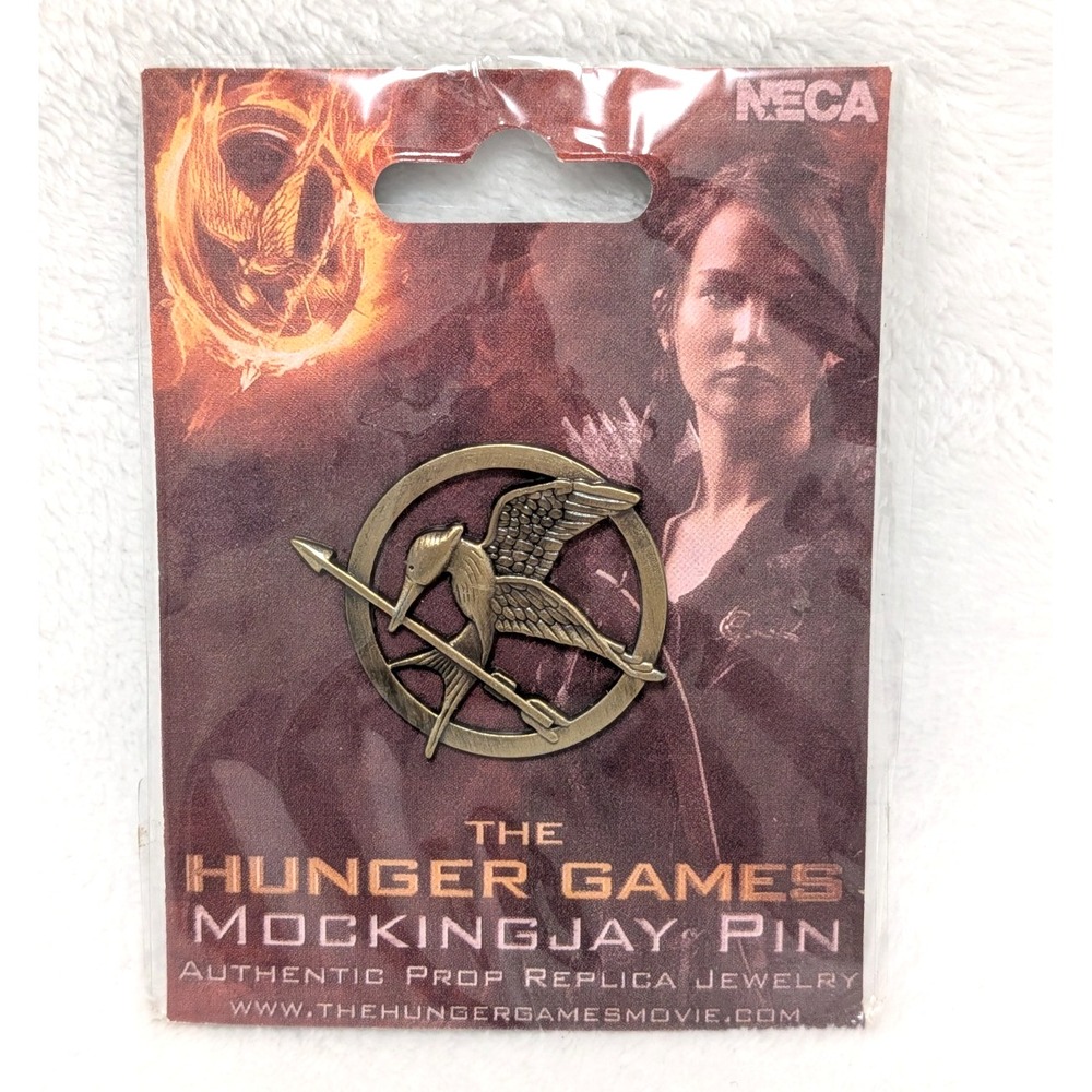 Hunger Games Mockingjay Lapel Pin New NOS 2012 MOC Movie Logo Prop Replica Pin